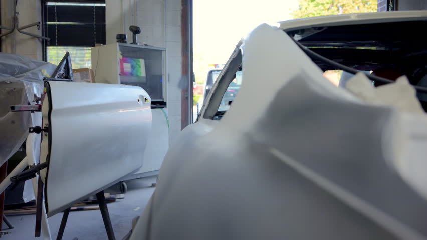 Car painting services . Preparing for painting an car element of body parts. 