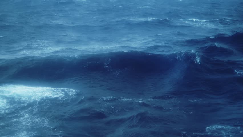 Rough Ocean and Waves at Sea, Choppy Blue Water Background and Ocean Swell on a Cruise Ship Boat Trip Crossing Drakes Passage to Antarctica, Across the Water to Antarctic Peninsula from Ushuaia