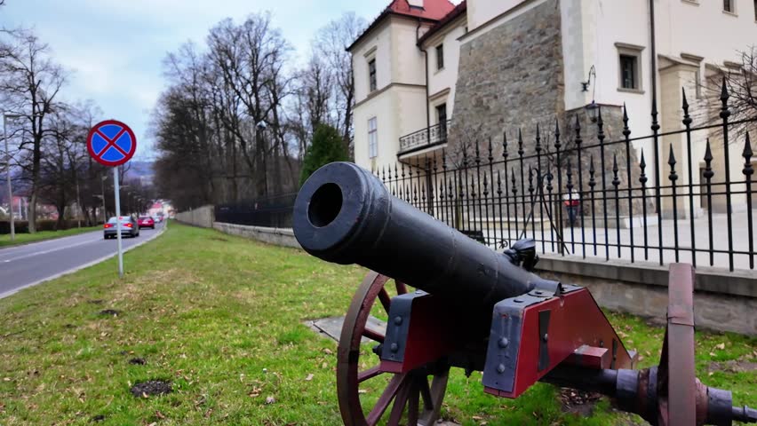 Historical artillery in front of the gate of the castle in Sucha Beskidzka - 4K palace