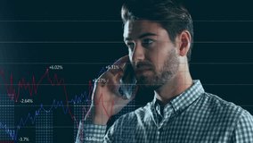 Man answering smartphone call and speaking while red and blue finance graphs emerging around him. Business, technology, digital, analytics, communication, innovation, professional - Powered by Shutterstock - Get 15% off with code: PIKWIZARD15