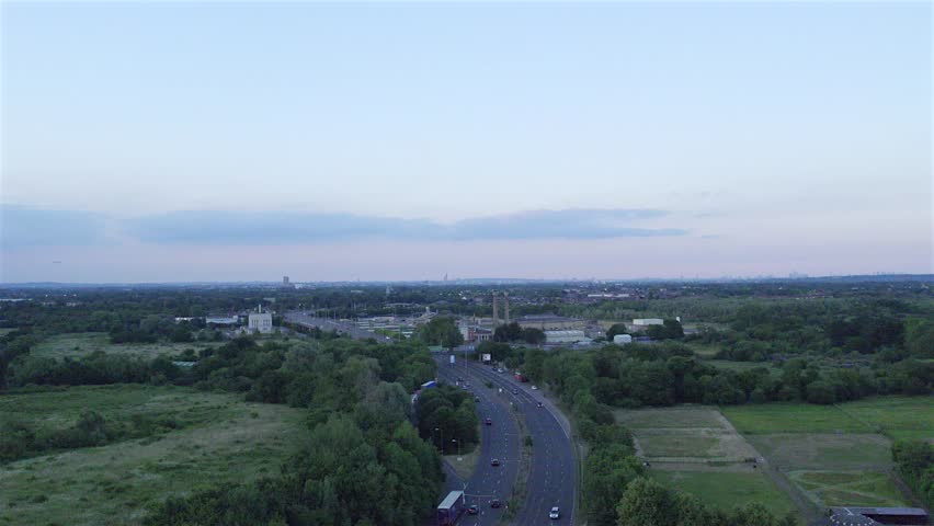 Aerial Drone View Of M3 Motorway In Sunbury In London. Evening Shot Over Motorway