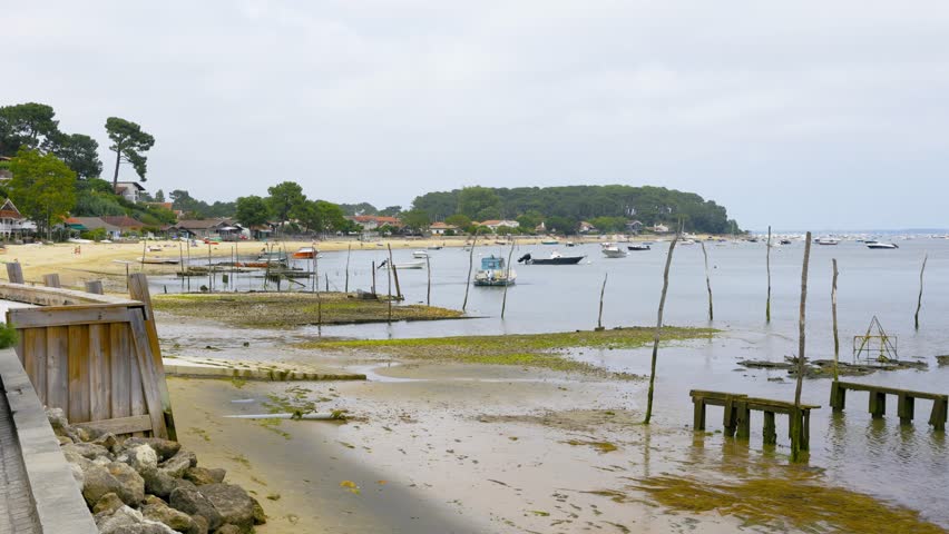 Cap-Ferret, France. Boats seen from an oyster village on the Bay of Arcachon