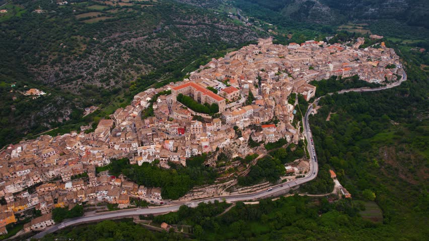 Ragusa Ibla winding alleys, panoramic view over the old town, valley and cathedral. Aerial Sicily.