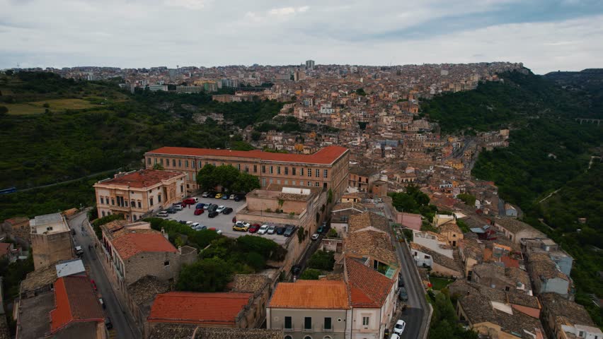 Ragusa Ibla cathedral square, Sicily, Italy. Historic old town buildings, narrow alleys. Scenic aerial