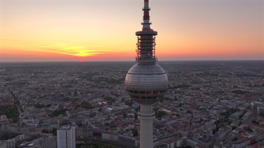 Alexanderplatz TV Tower Close Up View, Fernsehturm at Sunset Time in Berlin City Center, Aerial Parallax Drone Shot.