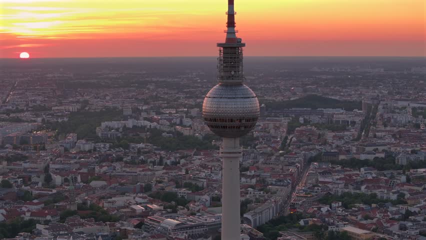 Alexanderplatz TV Tower Close Up View, Fernsehturm at Sunset Time in Berlin City Center, Aerial Parallax Drone Shot.