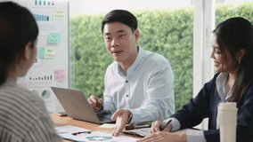 Young people asia man talk advice ESG work eco go green net zero waste SDGs growth hope clean energy control carbon credit offset recycle report. The way forward asian company workshop project office. - Powered by Shutterstock - Get 15% off with code: PIKWIZARD15