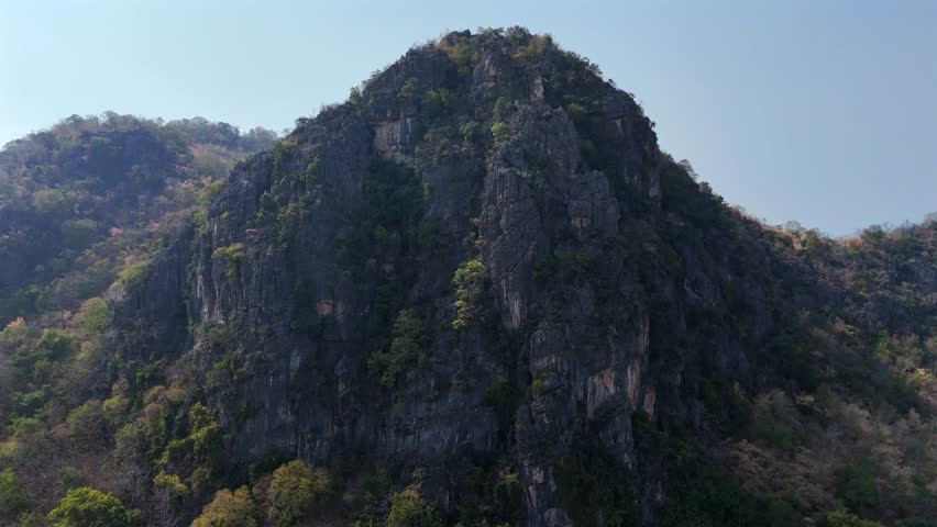 Rocky Thai mountains and jungle landscape from drone