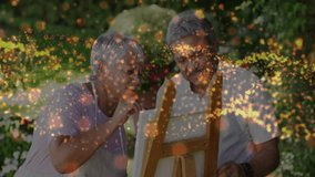 Elderly couple tapping blank canvas then dipping brushes in garden patio, practicing art hobby. Collaboration, creativity, relaxation, outdoor, botanical, vibrant, pastime - Powered by Shutterstock - Get 15% off with code: PIKWIZARD15