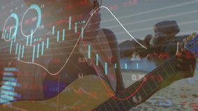 Musician plucking guitar chord on beach, animating financial charts and circular gauges shifting. Guitarist, financial data, beach scene, live performance, digital overlays, tranquility, soundscape - Powered by Shutterstock - Get 15% off with code: PIKWIZARD15