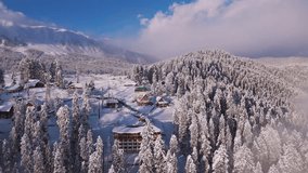 Aerial view of alpine hotels in Gulmarg blanketed by fresh snowfall. - Powered by Shutterstock - Get 15% off with code: PIKWIZARD15