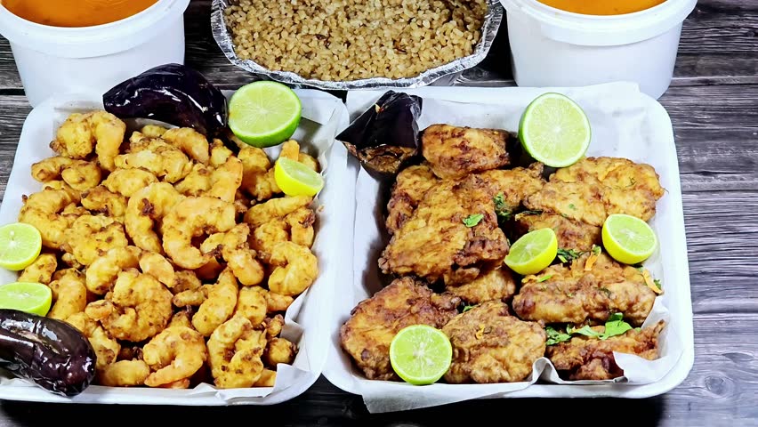 seafood dishes of Fried Epinephelus fish fillet, Fried shrimps, fish rice, and assorted seafood creamy soup of shrimps, squid, crabs, fish fillet, herbs, dill, garlic and onion, seafood mixture soup