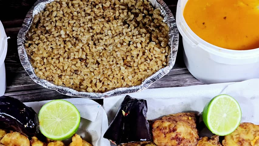 seafood dishes of Fried Epinephelus fish fillet, Fried shrimps, fish rice, and assorted seafood creamy soup of shrimps, squid, crabs, fish fillet, herbs, dill, garlic and onion, seafood mixture soup