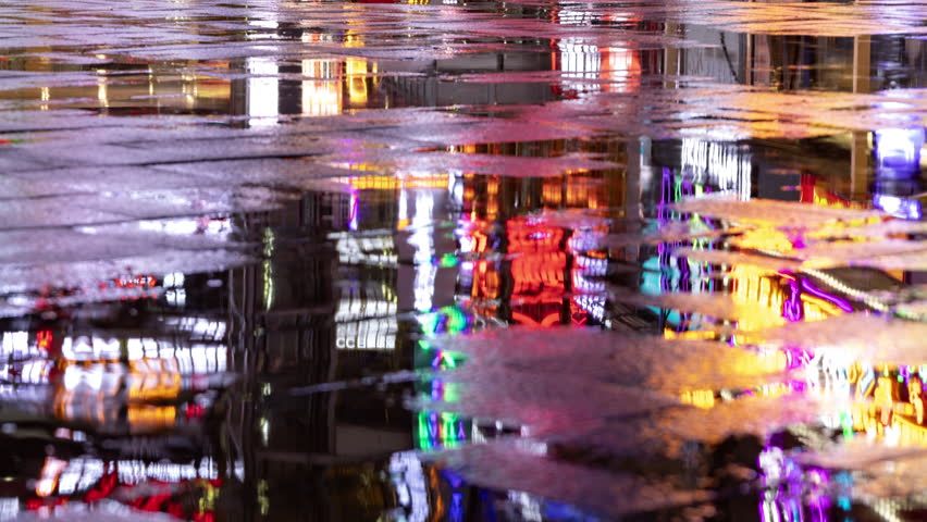 CHONGQING, CHINA - 28 MAY 2025 : Timelapse of the amazing Chongqing cyberpunk city neon street scene in the rain at night