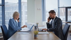 Busy executives using mobile phones discussion in boardroom workspace. Multitasking professionals communicating remotely. Partners talking smartphones exchanging documents. Teamwork collaboration - Powered by Shutterstock - Get 15% off with code: PIKWIZARD15