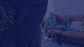 Tech overlay animating map over living room while man offering roses and gift to surprise woman. Digital, romance, festive, cozy, gesture, celebration, modern - Powered by Shutterstock - Get 15% off with code: PIKWIZARD15