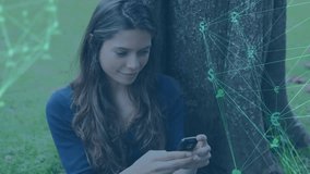 woman tapping smartphone at tree and generating finance network with currency nodes and chart bars. Technology, communication, innovation, connectivity, digital, outdoor, nature - Powered by Shutterstock - Get 15% off with code: PIKWIZARD15