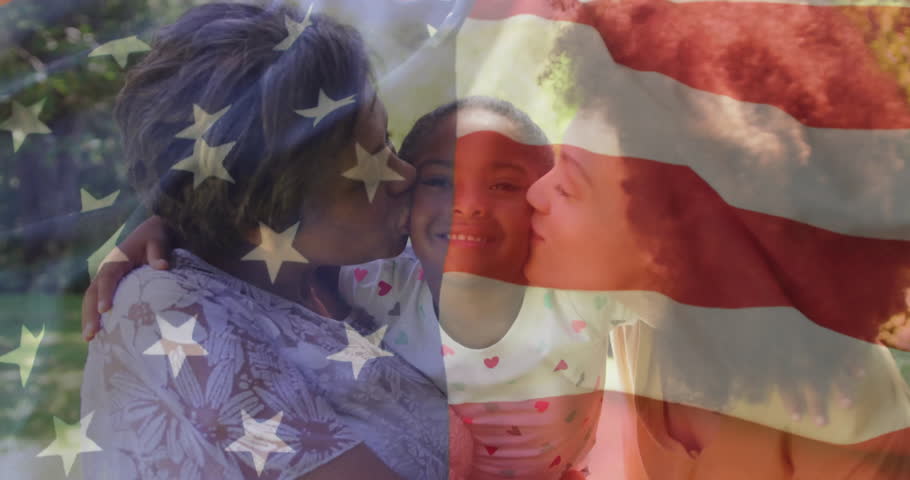 Family trio holding child and kissing in garden, promo flag overlay sliding off to reveal portrait. Family, affection, unity, togetherness, outdoor, celebration, warmth