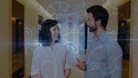 After exchanging looks, woman and man walking hallway, sharing tech insights with holographic gears. Collaboration, innovation, futuristic, workplace, digital, communication, dynamic - Powered by Shutterstock - Get 15% off with code: PIKWIZARD15