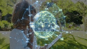 Woman activating AR data globe by tapping tablet in sunny park, visualizing business metrics. Technology, innovation, connectivity, digital, futuristic, outdoor, collaboration - Powered by Shutterstock - Get 15% off with code: PIKWIZARD15