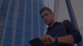 Tech pro tapping tablet and initiating floating binary overlay while scanning office tower data. Futuristic, innovation, digital, urban, modern, connectivity, professional - Powered by Shutterstock - Get 15% off with code: PIKWIZARD15