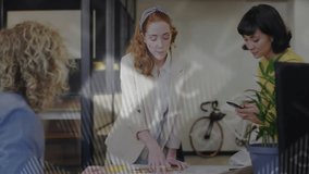 Three coworkers exchanging ideas at table activating data overlays aligning business insights. Collaboration, teamwork, innovation, digital, analytics, brainstorming, modernity - Powered by Shutterstock - Get 15% off with code: PIKWIZARD15