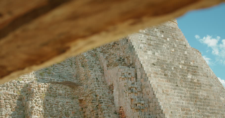 Ancient Mayan pyramid temple at Uxmal, Yucatan, Mexico during tourist tour