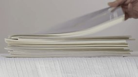 A stack of different  magazines on table to save space or  put in order - Powered by Shutterstock - Get 15% off with code: PIKWIZARD15