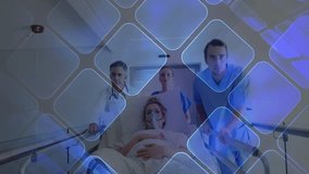 Medical team pushing stretcher along corridor emitting blue diamonds signifying patient transport. Emergency, healthcare, diagnostics, technology, professionalism, safety, clinical - Powered by Shutterstock - Get 15% off with code: PIKWIZARD15