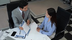 Business people and lawyers discussing contract papers sitting in the table at office. concepts of law, advice, legal services. - Powered by Shutterstock - Get 15% off with code: PIKWIZARD15