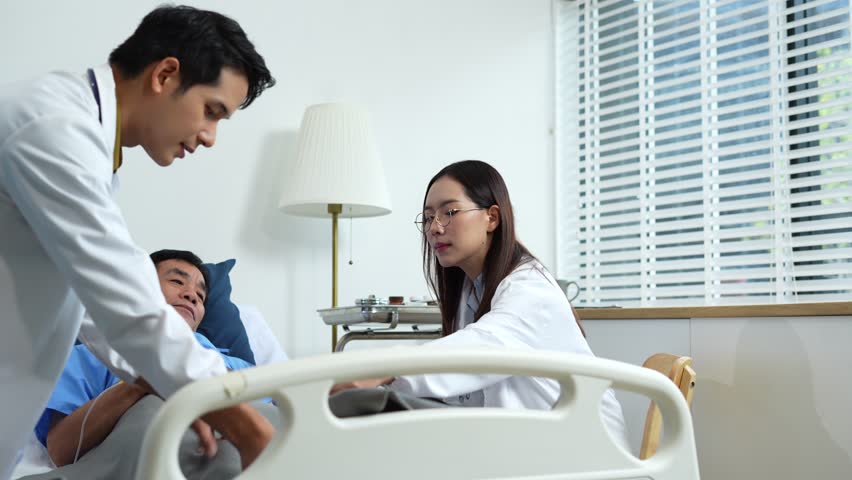 doctor talking with man patient for monitoring and check up after surgery.