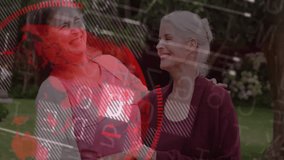 Two women laughing in garden, activating numeric code overlays with red circles illustrating bond. Affection, companionship, harmony, outdoor, serenity, connection, friendship - Powered by Shutterstock - Get 15% off with code: PIKWIZARD15