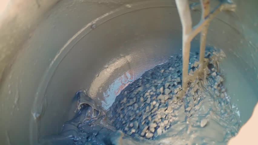 Inside view, concrete mixer rotating in slow motion