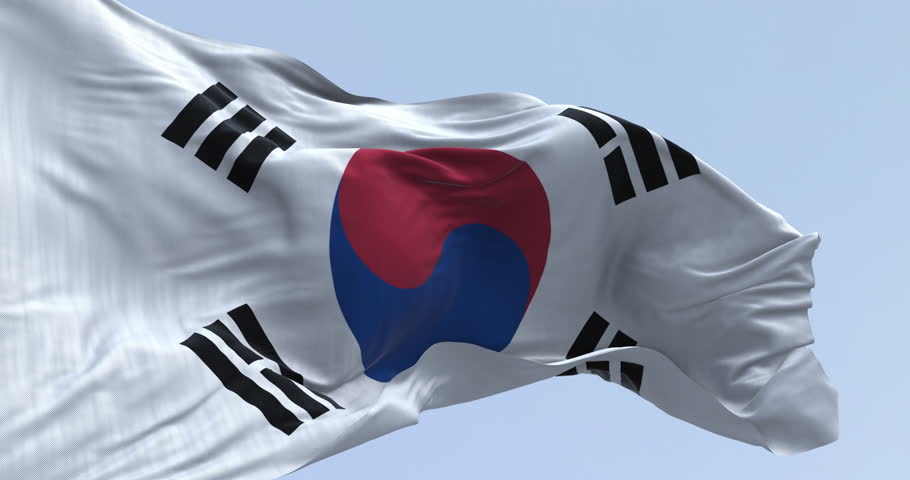 Close-up of South Korea national flag waving in the wind. White field, red-blue Taegeuk center, four black trigrams. Seamless 3d render animation. Slow motion loop. Selective focus