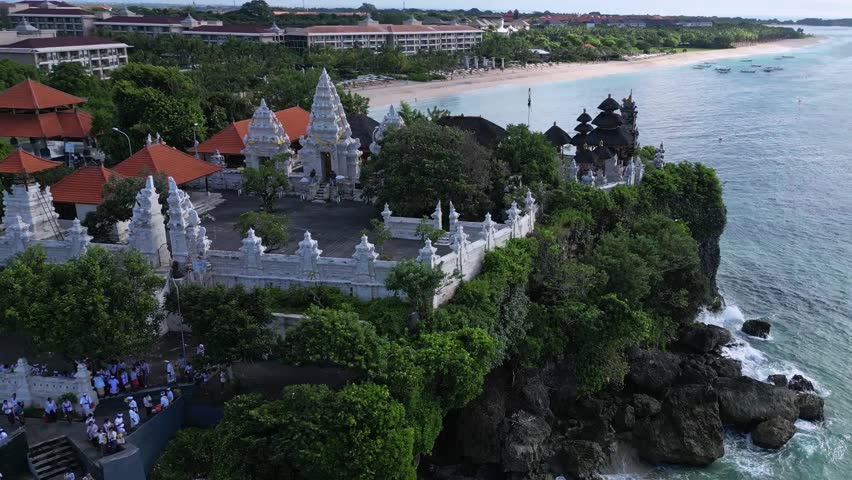 Aerial view of Hindu temple at Indian Ocean coastline of beautiful island of gods.Nusa Dua.Bali.Indonesia