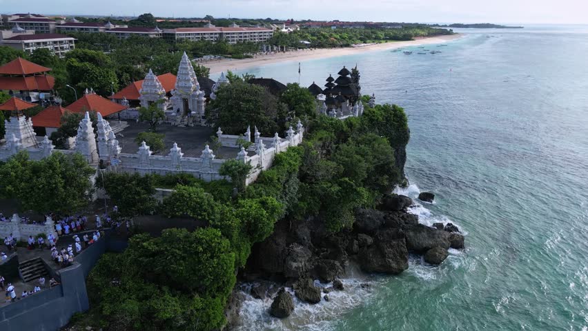 Aerial view of Hindu temple at Indian Ocean coastline of beautiful island of gods.Nusa Dua.Bali.Indonesia