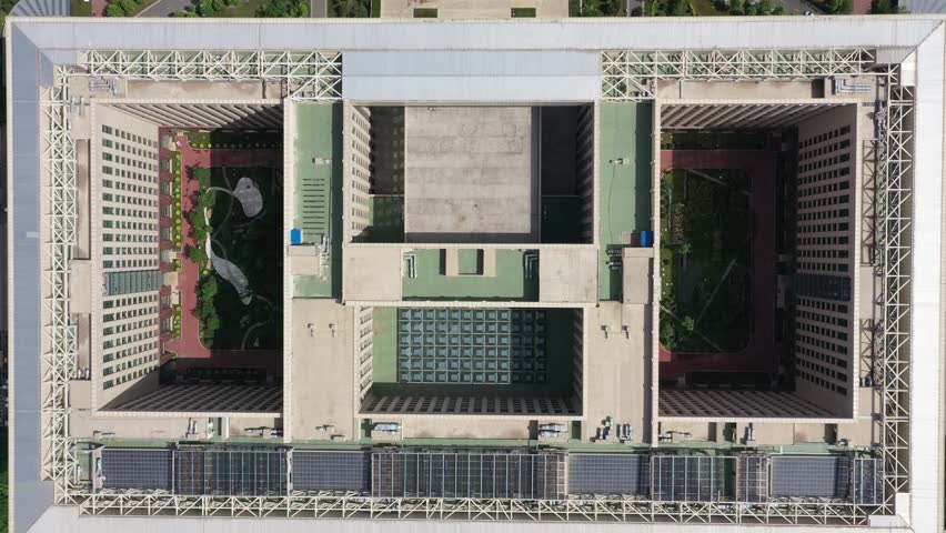 The aerial perspective highlights the striking design of Shijiazhuang Zhengding FTZ Business Center, featuring its impressive layout, green spaces, and surrounding urban environment.