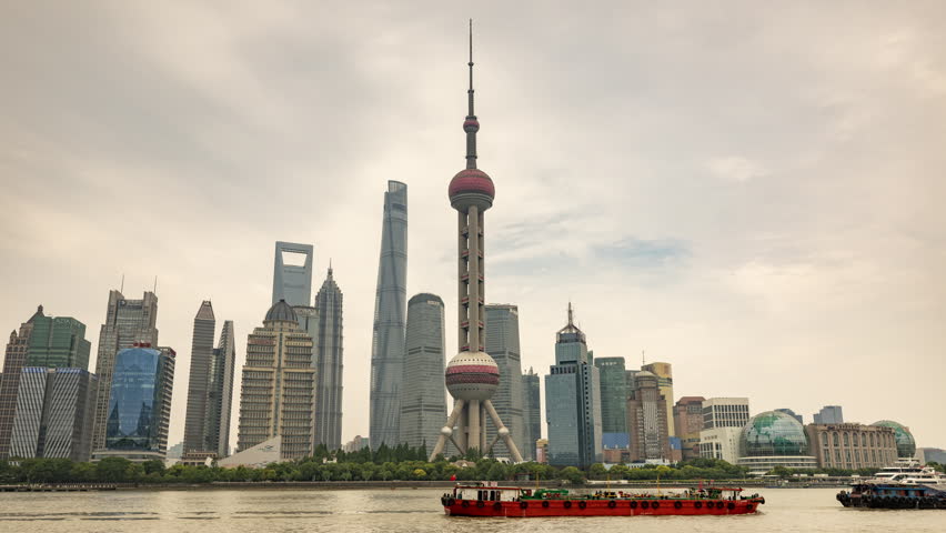 SHANGHAI, CHINA - 11 JUNE 2025 : Timelapse of the amazing Shanghai city skyline from a high vantage point 