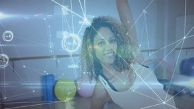 Coach initiating side-stretch in fitness, group mirroring under pulsing overlay tracking metrics. Fitness, exercise, wellness, contemporary, motivation, movement, training - Powered by Shutterstock - Get 15% off with code: PIKWIZARD15