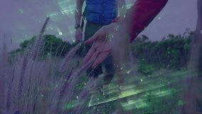 woman raising arm brushing grass while man observing, digital overlay highlighting nature education. Outdoor, adventure, exploration, nature, tranquility, discovery, wilderness - Powered by Shutterstock - Get 15% off with code: PIKWIZARD15