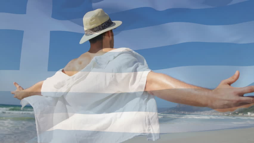Travel enthusiast arriving at sunlit seashore, pivoting toward sky with Greek flag overlay. Beach, vacation, leisure, voyage, serenity, adventure, seaside