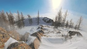 Snowy hillside with wind lifting snow particles on bright winter morning - Powered by Shutterstock - Get 15% off with code: PIKWIZARD15