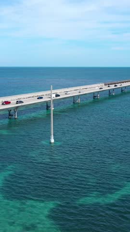 Aerial shot of the Seven Mile Bridge in Florida which connects several of the Florida Keys on the way to Key West. Vertical Video.