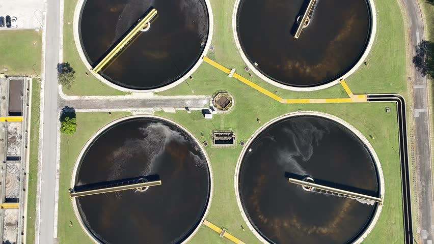 Aerial view of circular sedimentation tanks used in the wastewater treatment process in an industrial sanitation plant