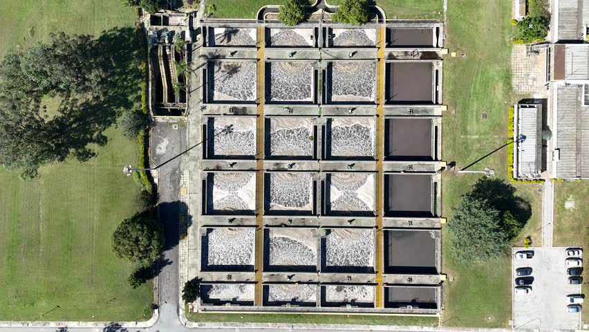Aerial 4K video of sedimentation tanks and activated sludge processing in an industrial wastewater treatment plant in Brazil