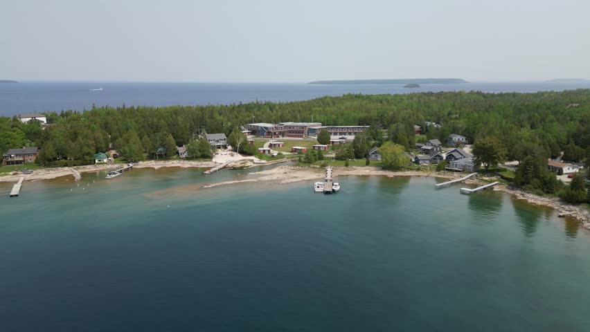 Aerial drone footage of Tobermory harbour marina Ontario Canada
