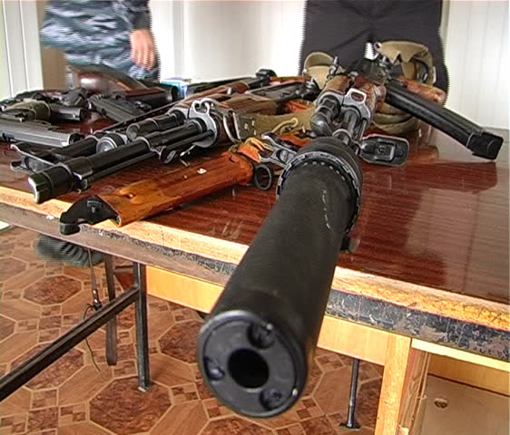 weapon in the hands of a soldier