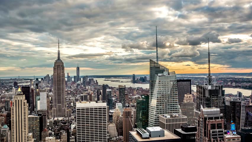 Dramatic aerial footage of New York City skyline as storm clouds gather over Hudson Yards and Manhattan, creating a powerful and moody atmosphere in the urban landscape.