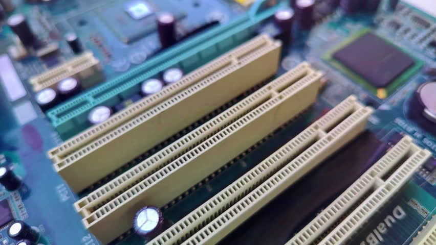 Circuit elements of an Vintage Model Pc Personel Computer Motherboard Footage.