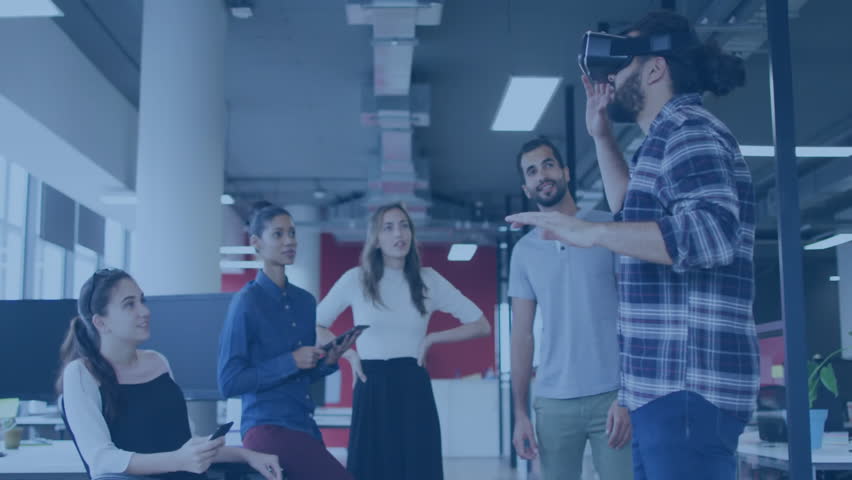 Man wearing VR headset in office raising hand summoning spinning globe hologram for tech demo. Virtual reality, technology, innovation, collaboration, digital, interface, futurism - Powered by Shutterstock - Get 15% off with code: PIKWIZARD15